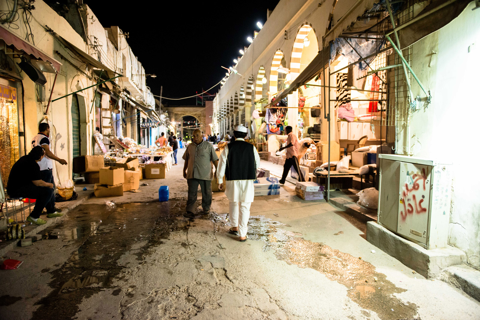 Abubaker walking through Tripoli's old town. 